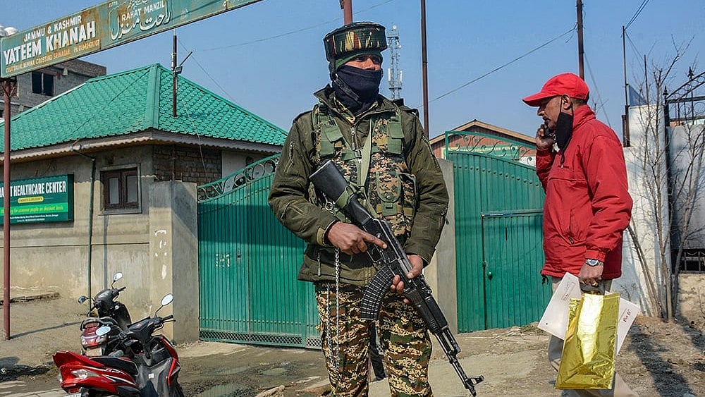 | Photo: PTI : Police Raids Multiple Locations In Kashmir